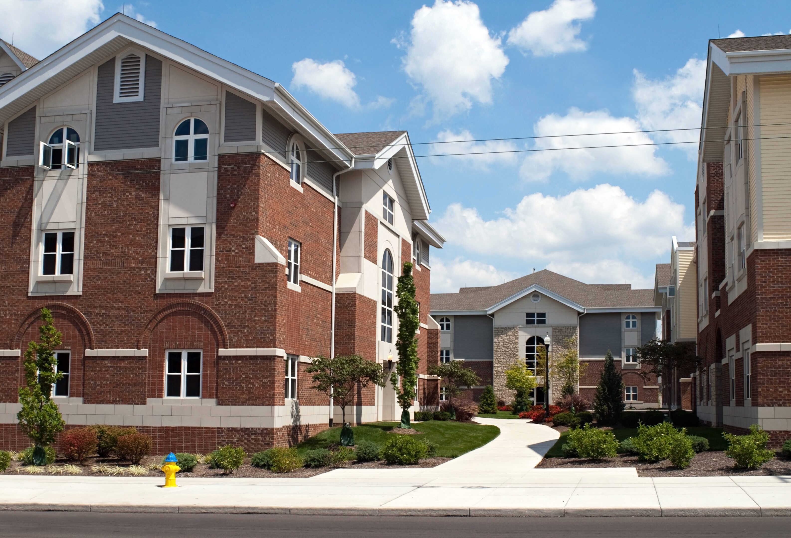 Residential area with sidewalk and trees